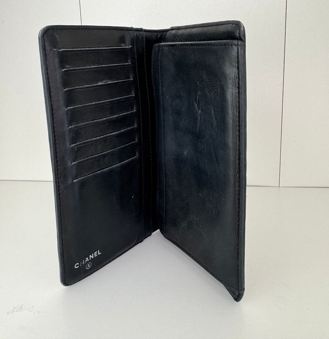 Chanel Camellia embossed lambskin leather flap wallet