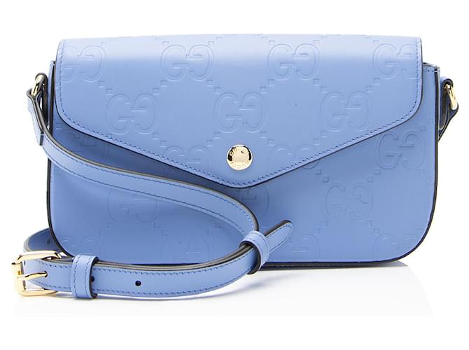 Gucci Jumbo GG Leather Mini Pochette