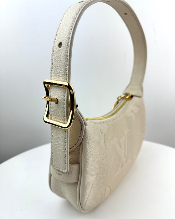 Louis Vuitton Mini Moon Monogram Empreinte Leather Creme