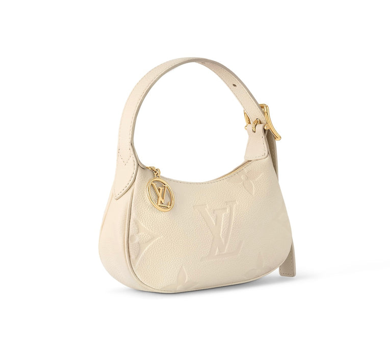 Louis Vuitton Mini Moon Monogram Empreinte Leather Creme