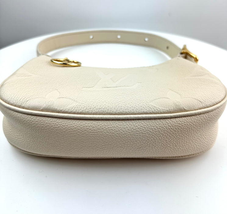 Louis Vuitton Mini Moon Monogram Empreinte Leather Creme