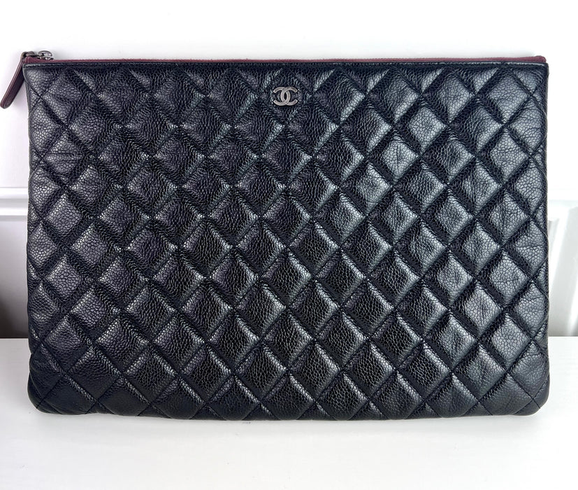Chanel large O-Case Pouch Caviar Leather