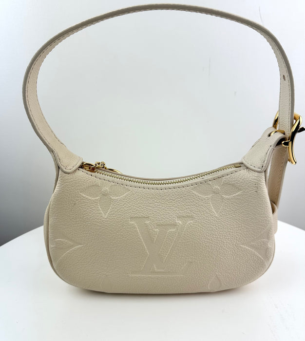 Louis Vuitton Mini Moon Monogram Empreinte Leather Creme