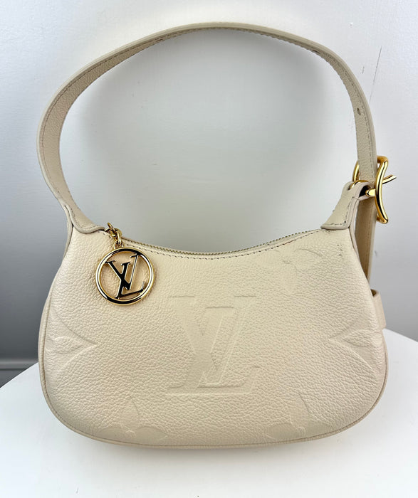 Louis Vuitton Mini Moon Monogram Empreinte Leather Creme