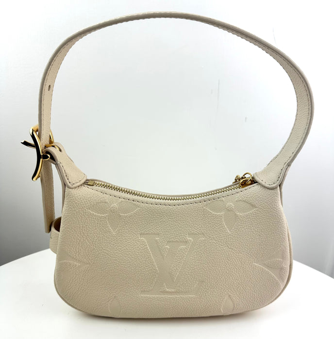 Louis Vuitton Mini Moon Monogram Empreinte Leather Creme