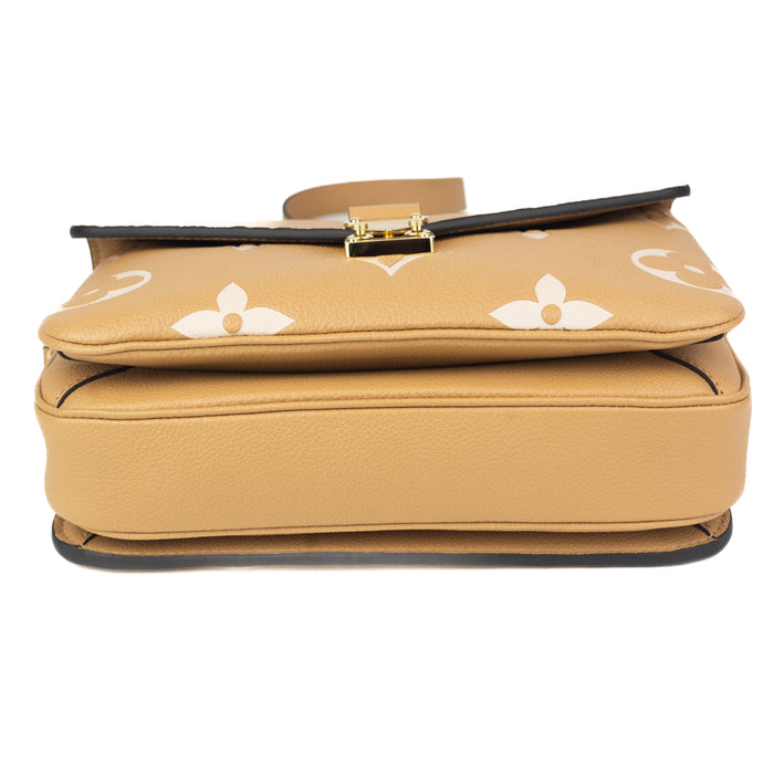 Louis Vuitton Pochette Metis in Monogram Empreinte Leather