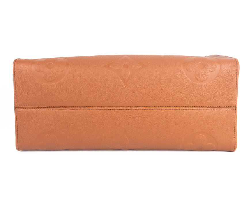 Louis Vuitton On The Go GM Monogram Empreinte Leather in Cognac