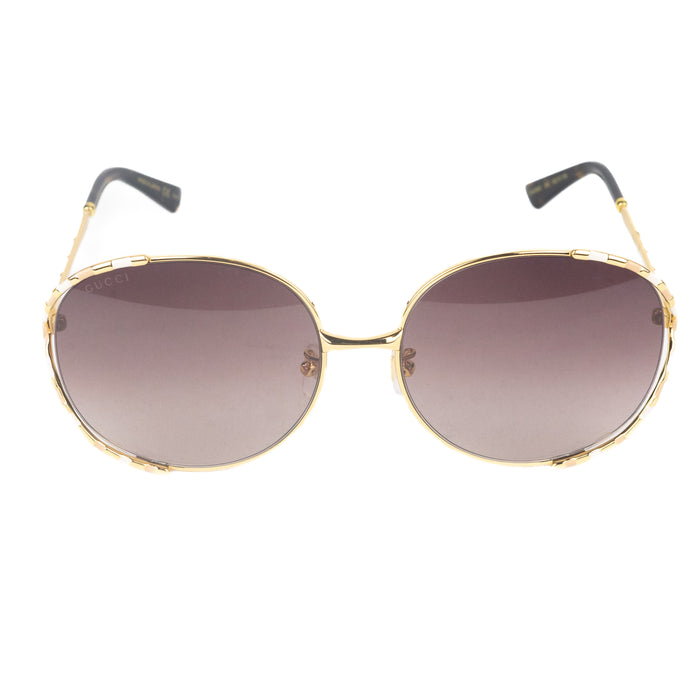 Gucci Gold Oval Sunglasses