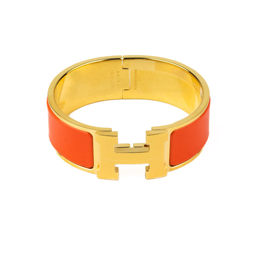 Hermes Clic Clac Bracelet in Orange with Gold Metal