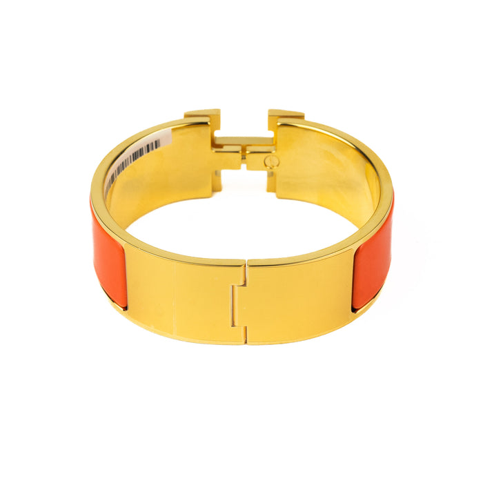 Hermes Clic Clac Bracelet in Orange with Gold Metal