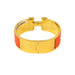Hermes Clic Clac Bracelet in Orange with Gold Metal