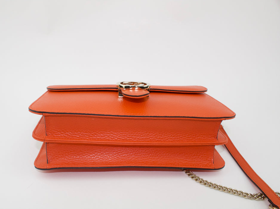 GUCCI MEDIUM INTERLOCKING G SHOULDER BAG ORANGE.