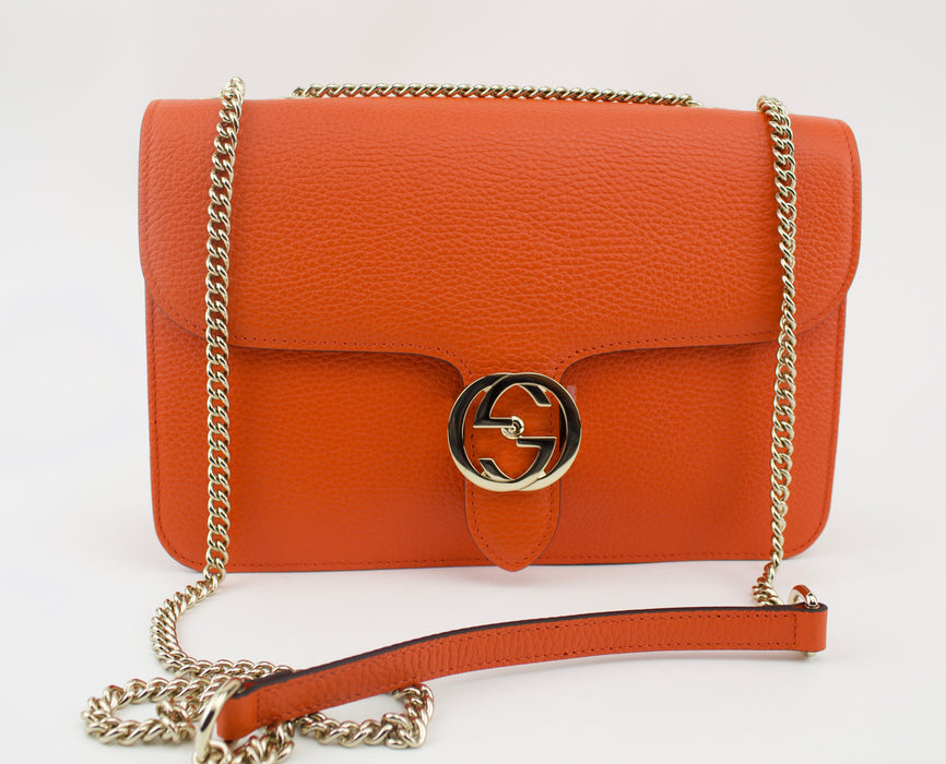 GUCCI MEDIUM INTERLOCKING G SHOULDER BAG ORANGE.