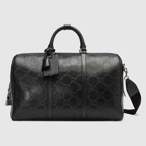 Gucci GG Embossed Duffle Bag in Black Leather