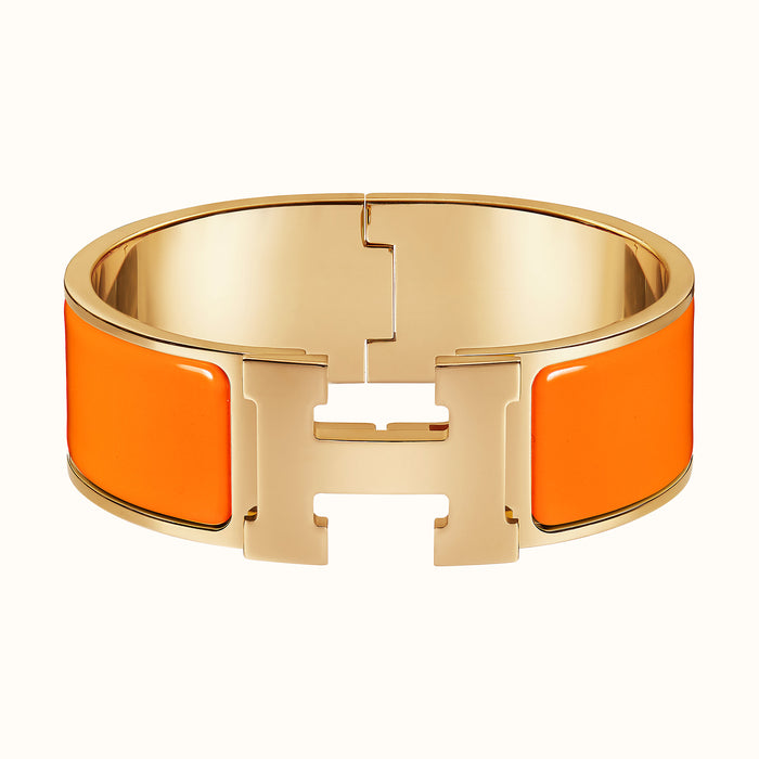 Hermes Clic Clac Bracelet in Orange with Gold Metal 