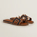 Hermes Oran Sandals in Bleu Brut and Gold