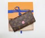LOUIS VUITTON EMILIE BLOOMS FLOWER WALLET - LuxurySnob