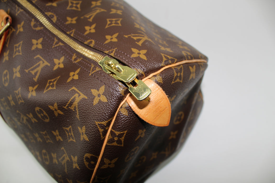 LOUIS VUITTON MONOGRAM KEEPALL 55 - LuxurySnob