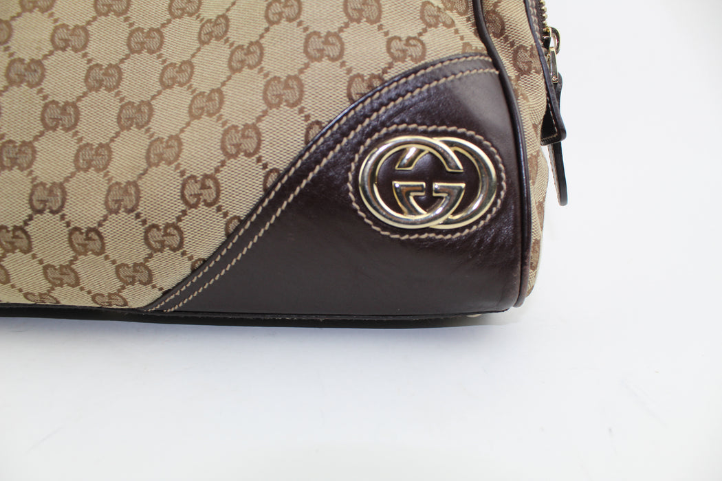 VINTAGE GUCCI MONOGRAM MEDIUM NEW BRITT BOSTON HANDBAG - LuxurySnob