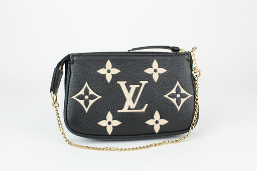 Louis Vuitton Mini Pochette Accessoires in Bicolor Monogram Empreinte Leather