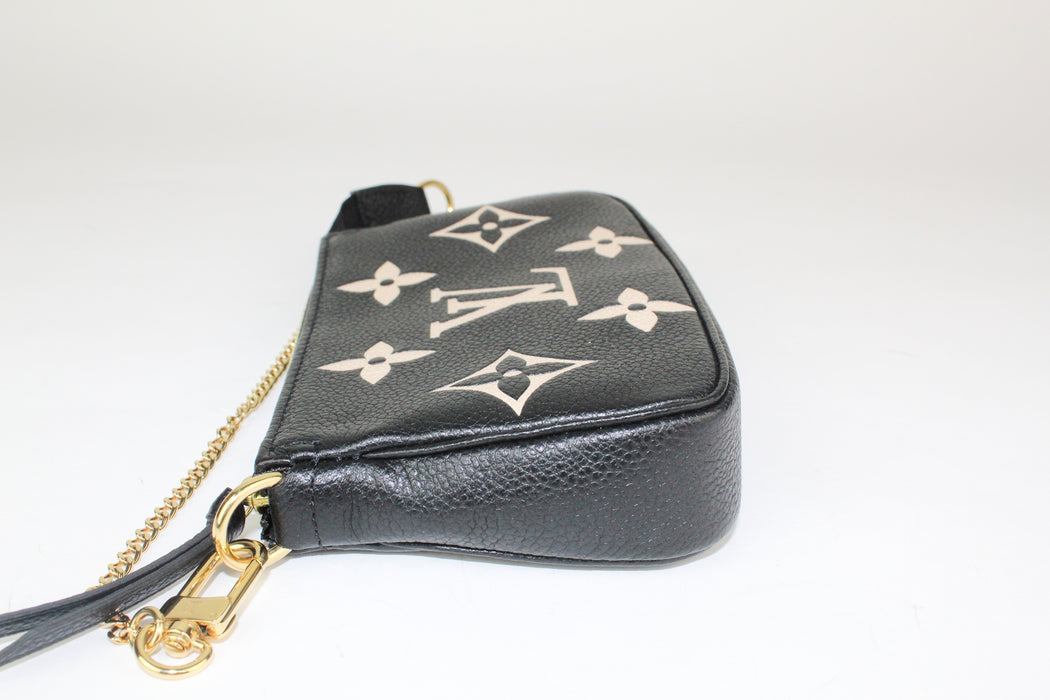 Louis Vuitton Mini Pochette Accessoires in Bicolor Monogram Empreinte Leather