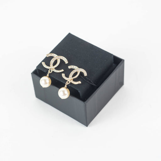 Chanel CC Dangling Golden Pearl Earrings