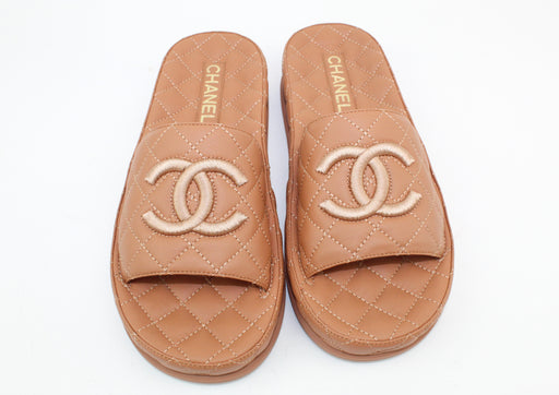 Chanel CC quilted slides