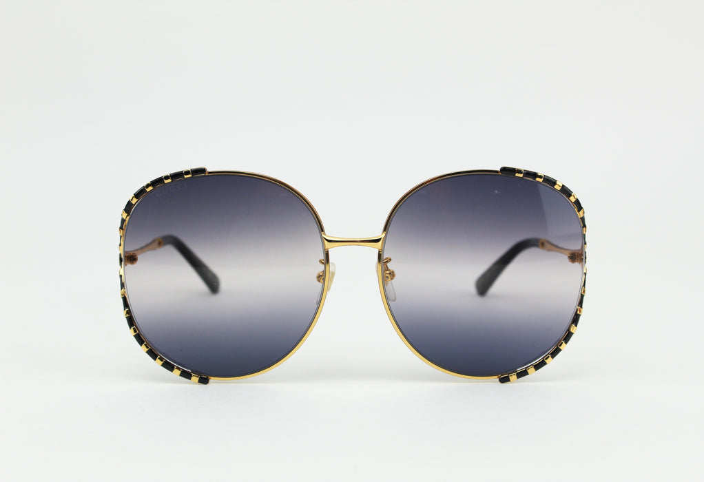 Gucci black and gold sunglasses