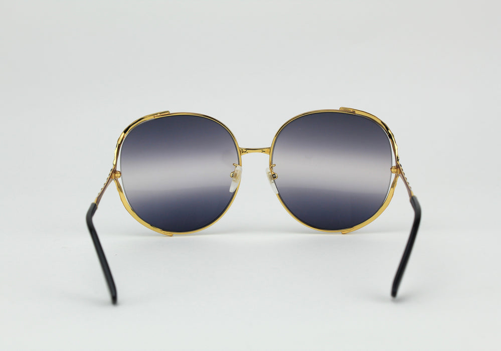 Gucci black and gold sunglasses