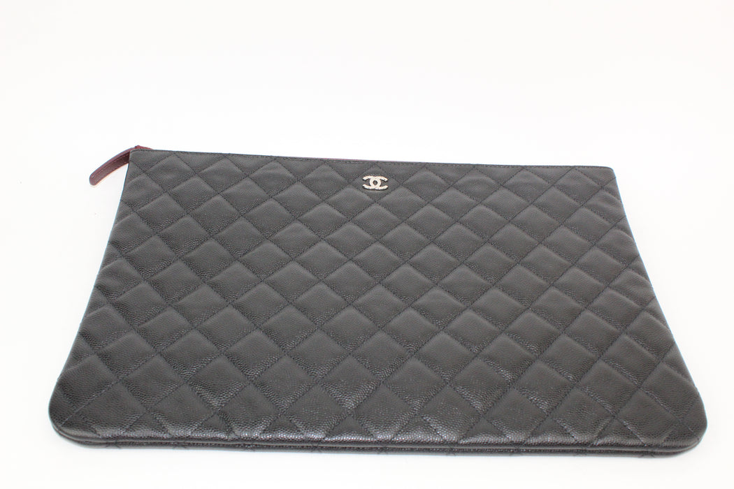 Chanel Large O Case Quilted Caviar Clutch