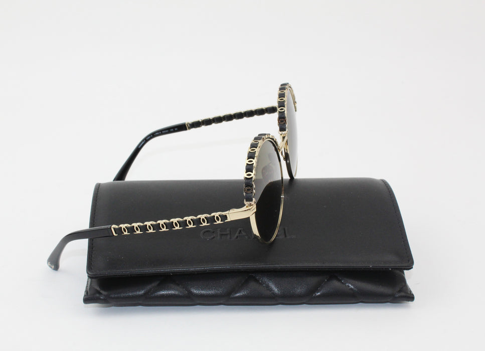 Chanel Black and Gold Round Sunglasses