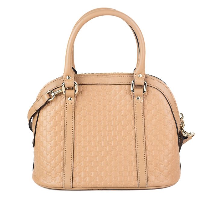 Gucci Micro Guccissima Mini Dome Bag in Nude