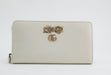 GUCCI PETIT BOW ZIP AROUND WALLET