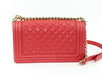 CHANEL MEDIUM CAVIAR BOY BAG IN RED - LuxurySnob