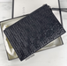 Gucci Black Gg Rhombus Quilted Leather Pouch