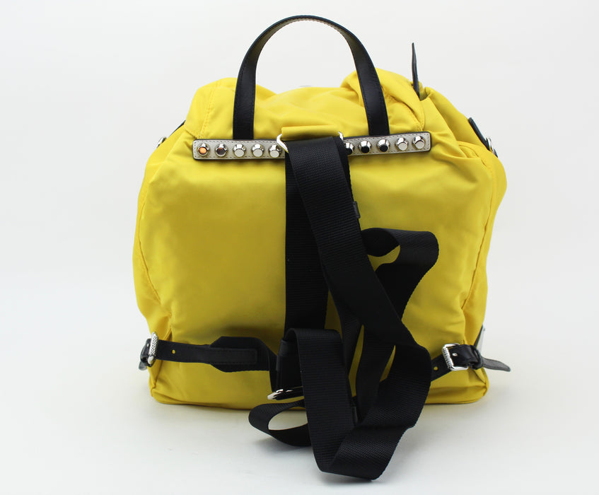 Prada yellow studded backpack