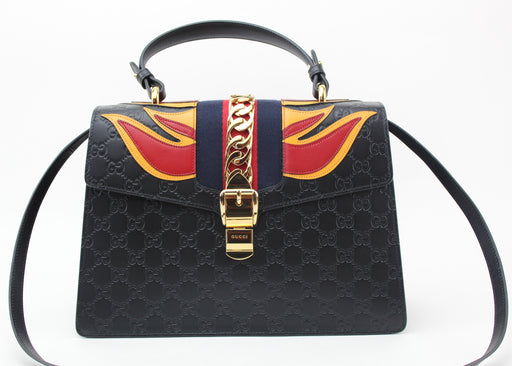 Gucci Sylvie bag with flames