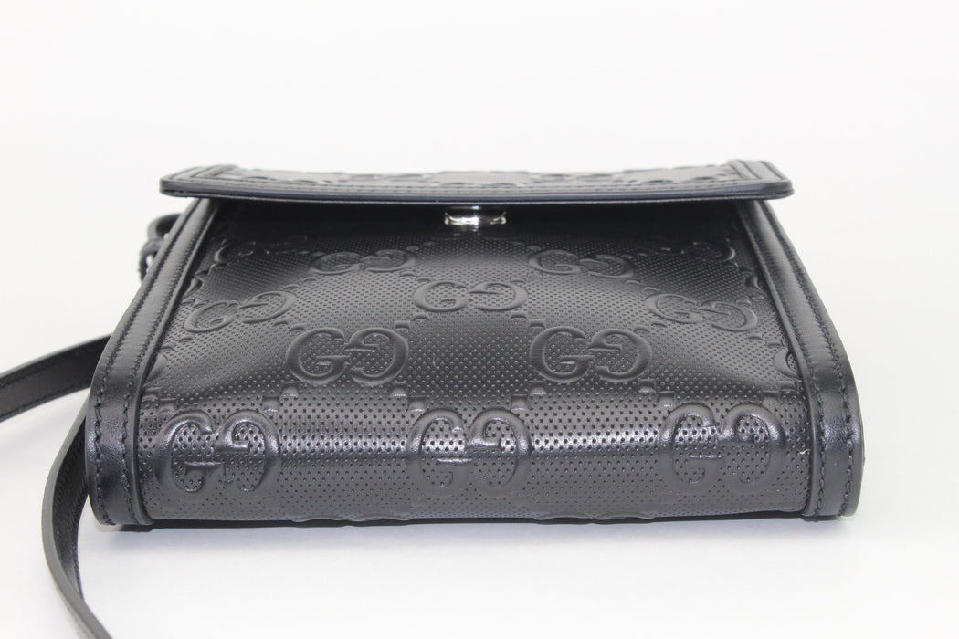 Gucci GG Embossed Messenger Bag