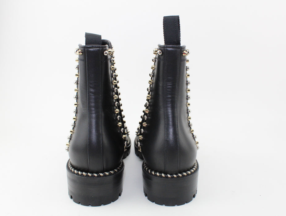 CHRISTIAN LOUBOUTIN CHASE A CLOU FLAF BOOTS