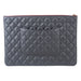 Chanel large O-Case Pouch Caviar Leather