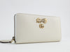 GUCCI PETIT BOW ZIP AROUND WALLET