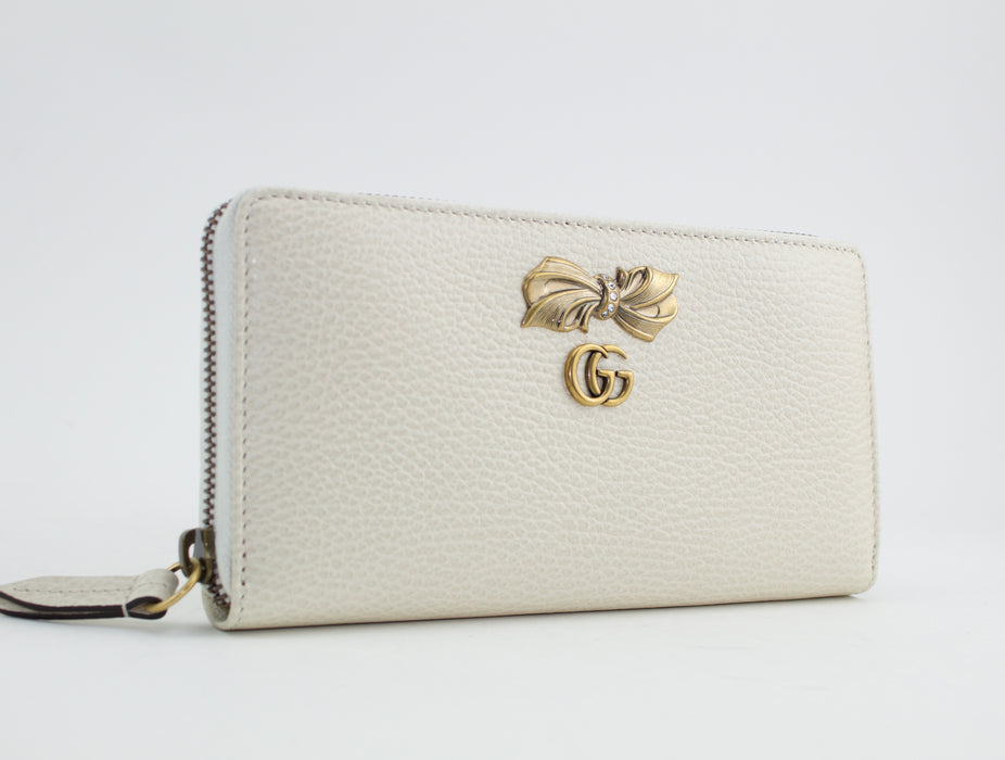 GUCCI PETIT BOW ZIP AROUND WALLET