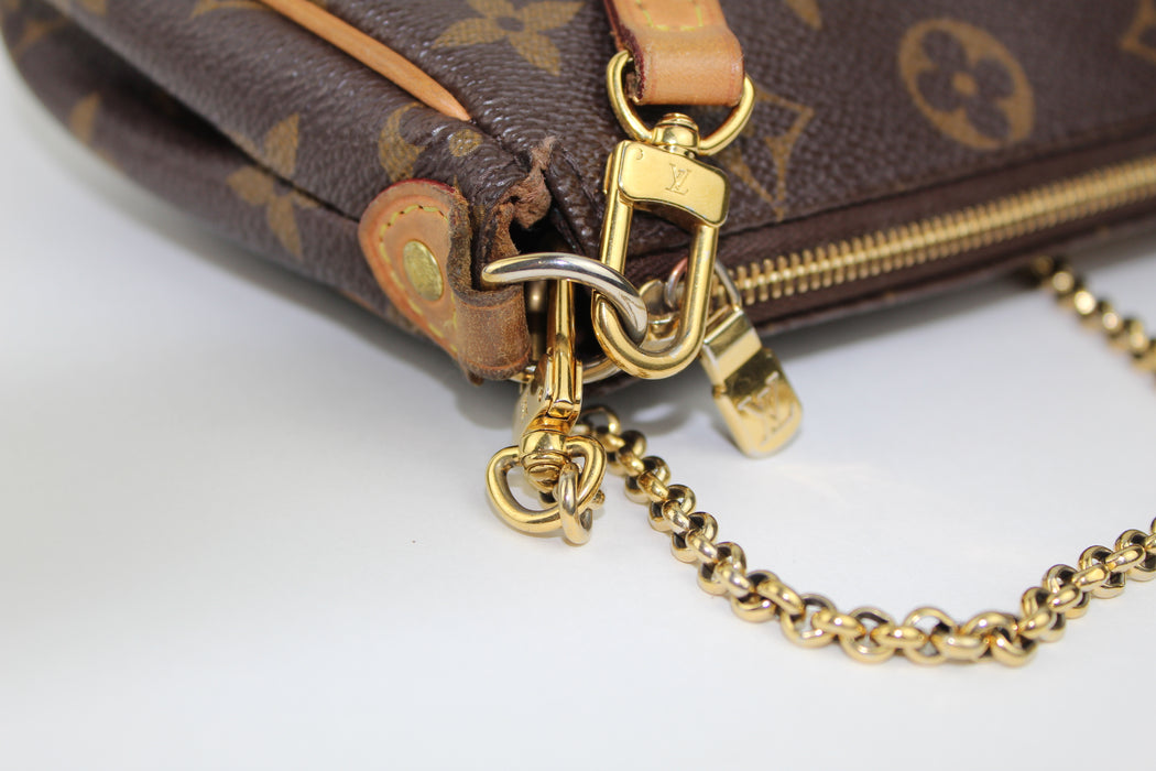 LOUIS VUITTON EVA CLUTCH - LuxurySnob