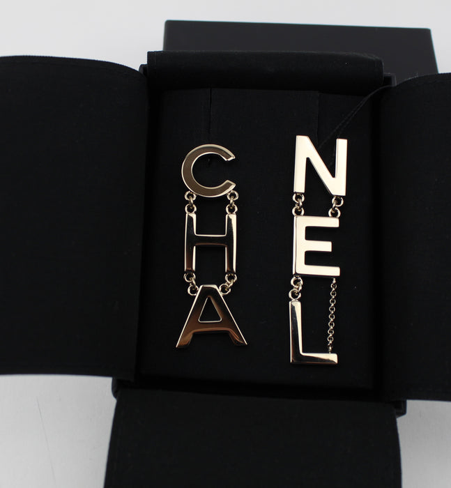 CHANEL METAL CHA-NEL LOGO DROP EARRINGS - LuxurySnob