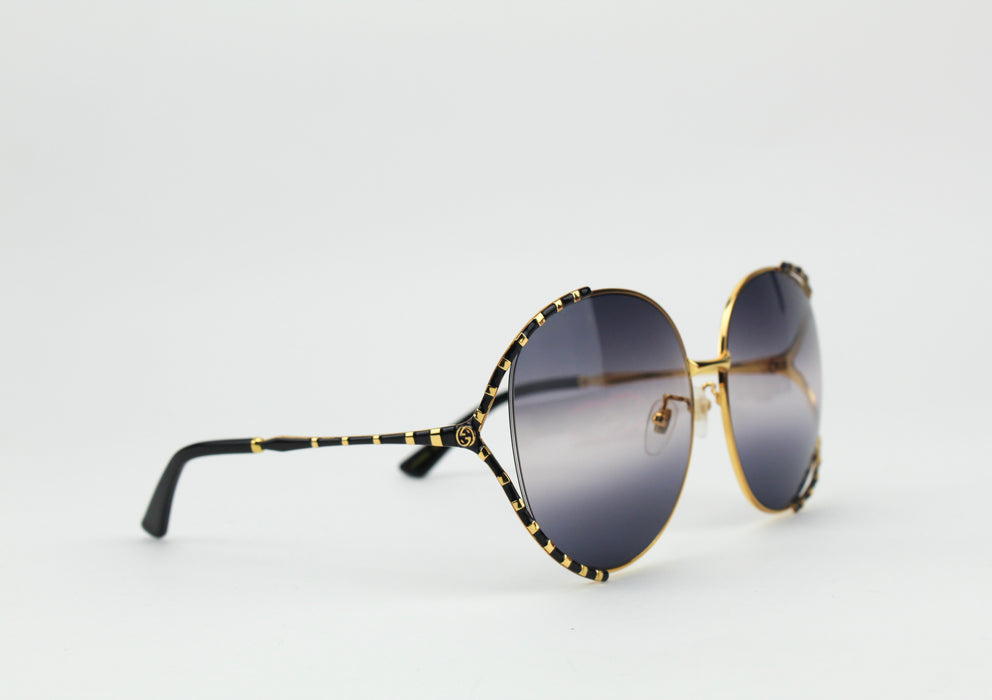 Gucci black and gold sunglasses