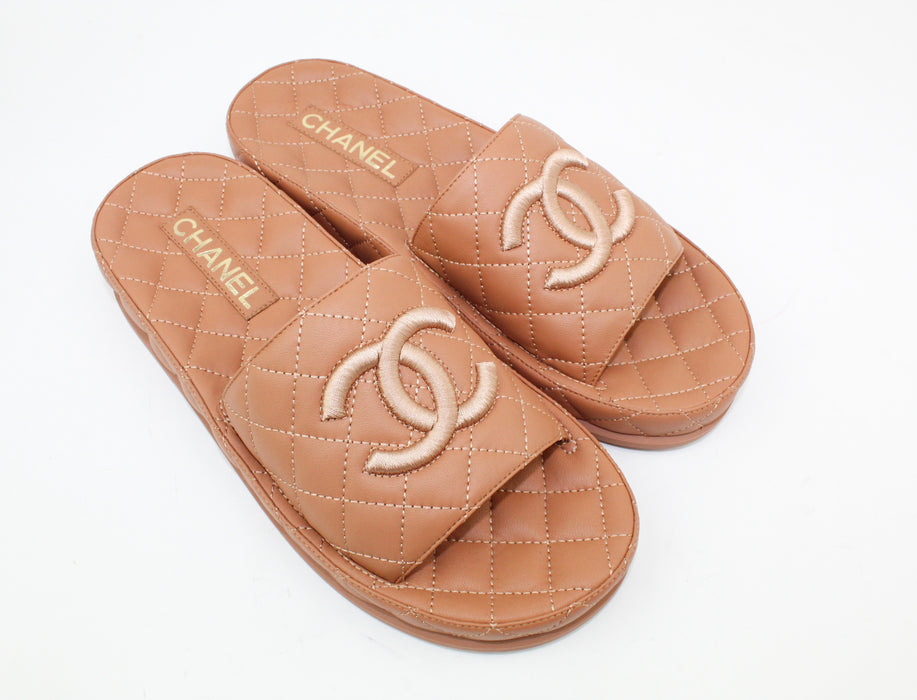 Chanel CC quilted slides