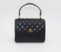 VINTAGE CHANEL TWIN TOP HANDLE FLAP BAG