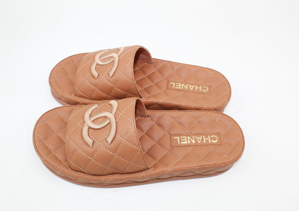 Chanel CC quilted slides