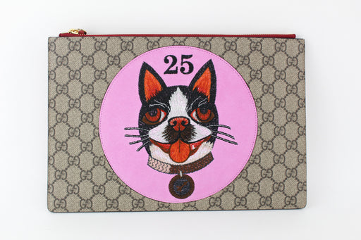 GUCCI GG SUPREME POUCH WITH BOSCO PATCH